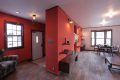 ブラッドオレンジ色で塗装したＬＤＫの壁面が、室内でも西海岸テイストを演出してくれます